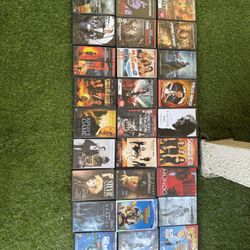 Lot Of 173 DVDs And Two VHS Cassettes 