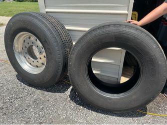 Truck Alcoa rim and 2 tires