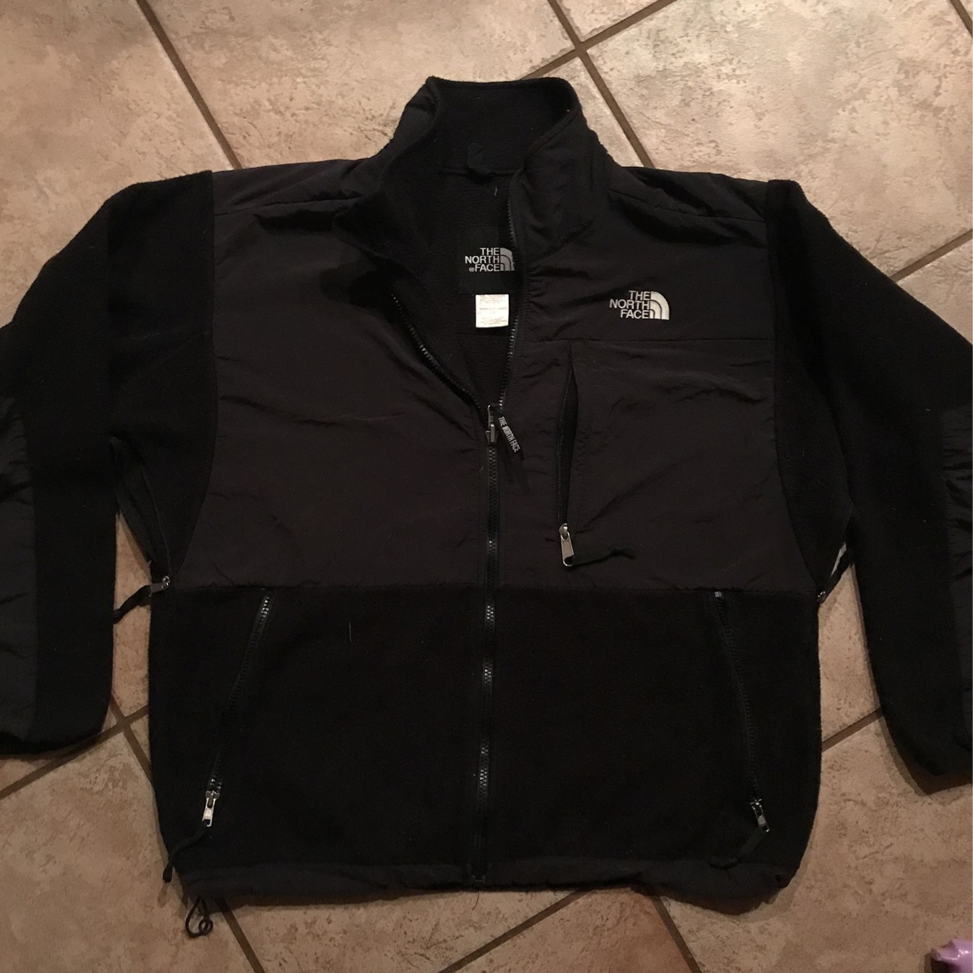 Woman’s Classic Black North Face Jacket