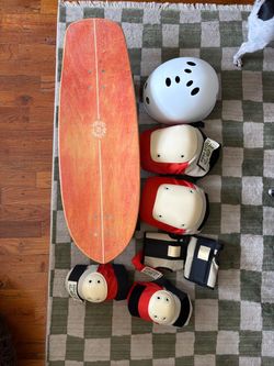 Grl swirl surf skateboard, triple eight helmet, killer 187 pads