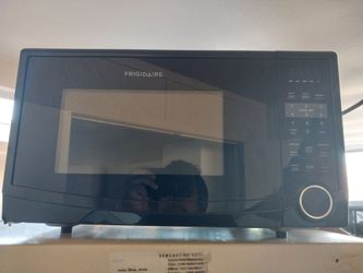 Amana electric stove and dishwasher and microwave
