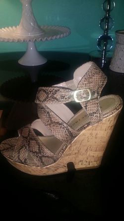 Cute snakeskin wedge heels....size 7...great condition!