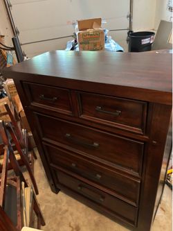 Bedroom furniture (wood). In excellent condition and hardly used.