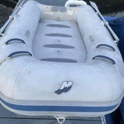 8 foot  Mercury Tender inflatable raft hard bottom  great for going to shore  from boat Goes soft on one side over a week. Still plenty of life left a