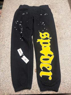 Black and yellow Sp5der sweatpants