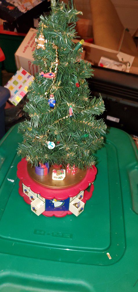Tree With boxes Of Ornaments 