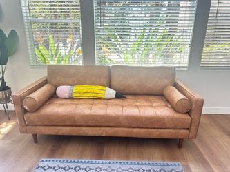 Brand new mid-century, modern light brown faux letter sofa