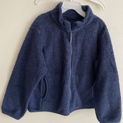 This is a Kids' Fluffy Yarn Fleece Full-Zip Jacket from UNIQLO. • Material: Commonly known as "Fluffy Fleece", it has a very soft and fluffy texture, 