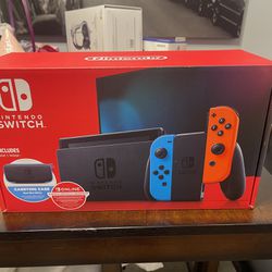 *****BRAND NEW NINTENDO SWITCH WITH CASE AND 1 YEAR ONLINE MEMBERSHIP INCLUDED******