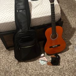 MIRIO Guitar Brand New. Comes With Bag, Extra Strings, And A Tuner. $100 OBO. 