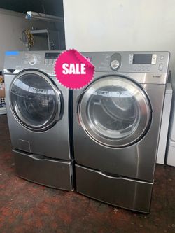 Samsung front loading washer and electric dryer set with pedestals working perfectly with 4 months warranty