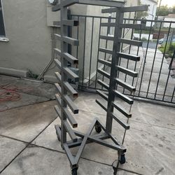 Portable cantilever on wheels. 61.5” H Shelves 12”LX 22”W,  Space between 3.5”-3.75”