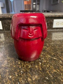 Red Ceramic Face Figurine Statue