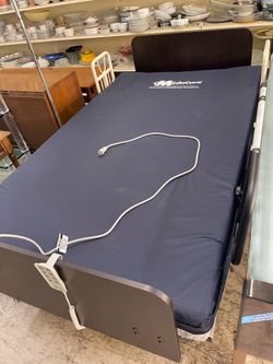 LIKE NEW MEDACURE FULL SIZE ELECTRIC HOSPITAL BED WITH RAILING MATTRESS WITH COVER