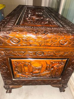 Antique Hand-Carved Wooden Chest with Figural Panels