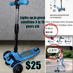 $25 6KU 3 Wheel Kick Scooter lights up multicolors,with Wide Deck in great condition adjustable high