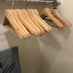 LOT OF 30 WOODEN HANGERS