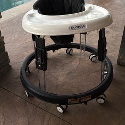 Baby Walker Very Portable And Goes On Carpets And Rugs 