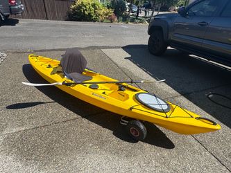 West Marine Yellow Sit-In Kayak with Paddle