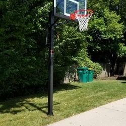 Lifetime 54 inch in ground basketball hoop, adjustable basketball court