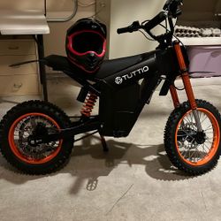 Tuttio Dirt bike And Helmet 