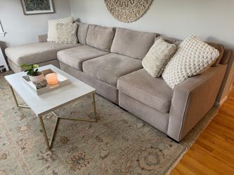 Beige Fabric Sectional Sofa with Chaise in VG Condition.