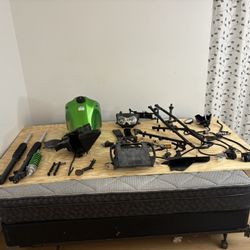 2014 KLR 650 Front Shocks, F/R Complete Brakes, Plus An Entire Bike Of Parts. 