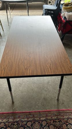 Square table 5 feet long, 2 feet 51/2 inches and 2 feet 1 inch tall