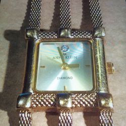 ANNE KLEIN GOLDTONE ONE DIAMOND LATTICE BRACELET WATCH 