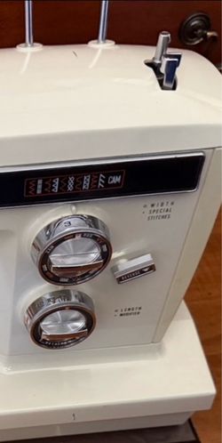 KENMORE Sewing Machine with Cabinet - flat bed, free arm and storage