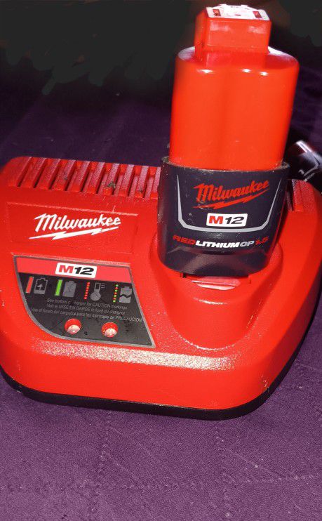 Milwaukee M12 Charger And 3 Batteries 
