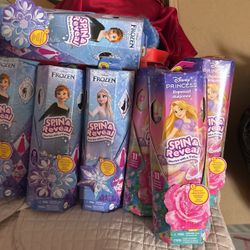 Spin And Reveal Anna , Elsa and Rapunzel Dolls $15 Each 