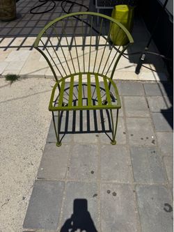 Four mid century vintage metal outdoor chairs