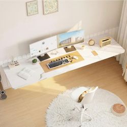 Wall Mounted Folding Desk,Floating Computer Desk for Small Spaces,White
72x22in engineered wood desktop with metal brackets, folds flat to save space 