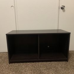 Entertainment Stand And Fishing Reels 