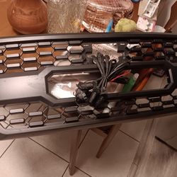 Raptor  Style Grill Looks Like It's For A Tacoma Google Said It's For A Ford Ranger 