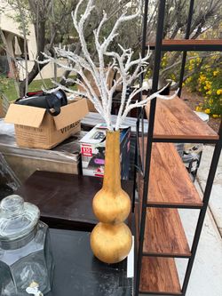 Beautiful statement-piece gold decorative vase with lush artificial greenery! Features an intricate gold lace-inspired design with raised beaded accen