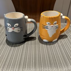 Two (2) Tag Cat Coffee Mugs 