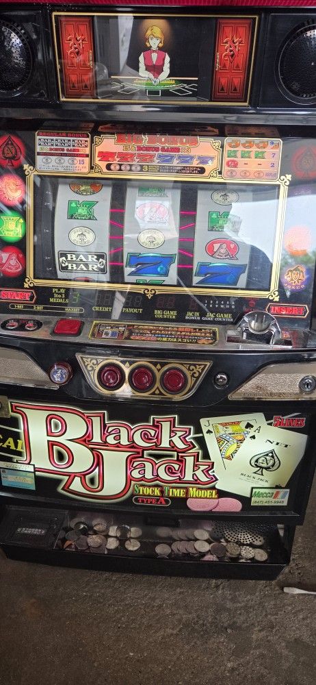 2 Slot Machines with play coins