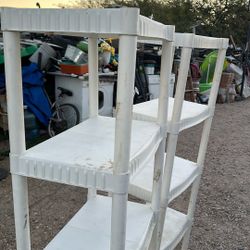 Two Plastic Shelves Measuring 64 Inches High By 22 Inches Long And 14 Inches Wide