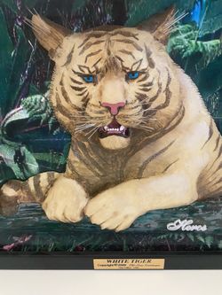 Very unique 1 of a kind 3-D effect beautiful hand sculpted and hand painted White Tiger enclosed in a very expensive shadow box.   Set in a high quali