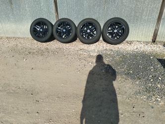 20" black rims brand new 6 lugs Bridgestone tires Chevrolet GMC Cadillac Escalade 100% tread