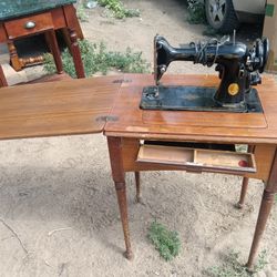 Singer Sewing Machine And Table 