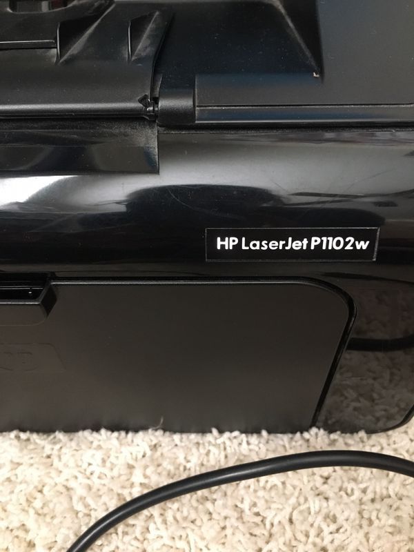 Home Office Printer and ink cartridge — HP LaserJet P1102w