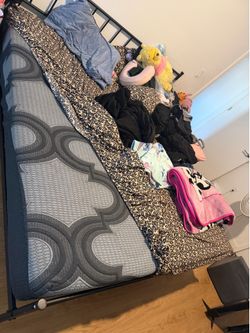 Almost brand new king size bed with frame