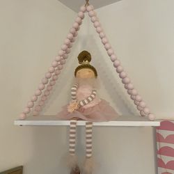 Weighted Doll On Swing