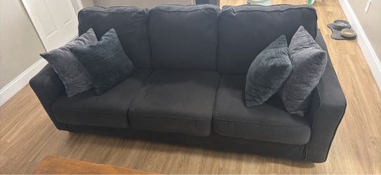 Loveseat and wood coffee table must go