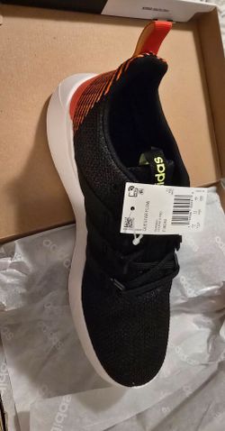 black Adidas Questar Flow running shoes