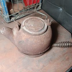 Antique cast iron teapot