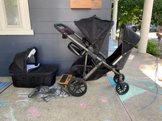 PRICE CHANGE 2013 Uppa Baby Vista with bassinet, 2nd toddler/rumble seat, skate board and never been used rain cover